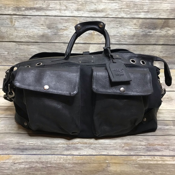 leather and canvas duffle bag
